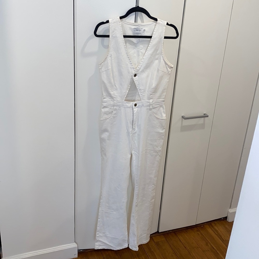 White jean jumpsuit with front cutout